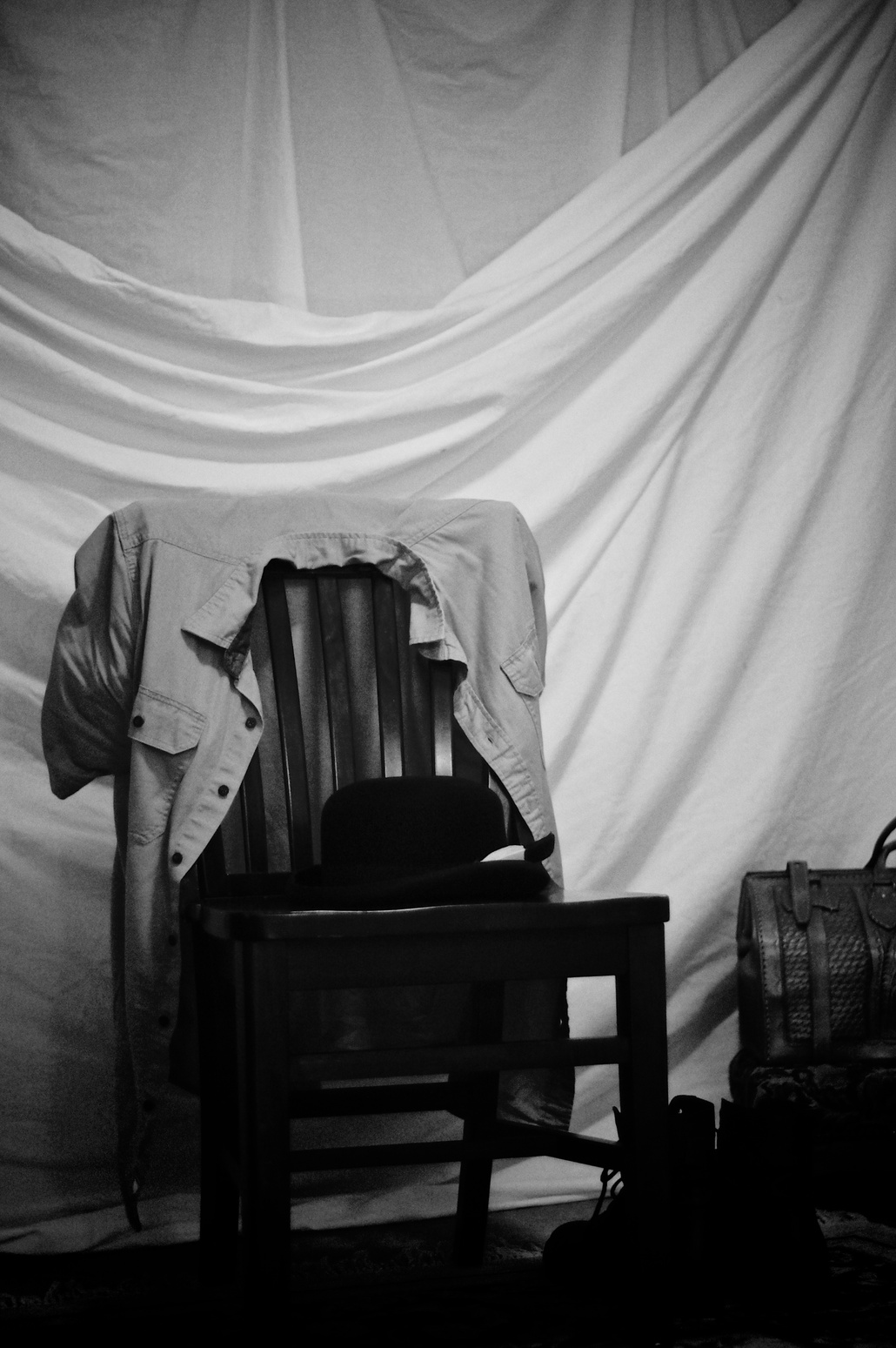 black and white back stage still life with clothing and props